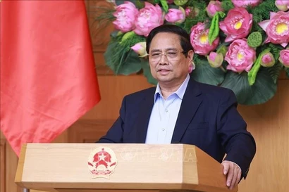 越南政府总理范明政发表讲话。图自越通社