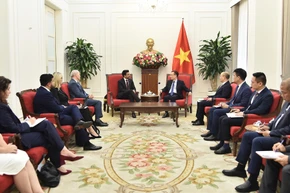 越南外交部长黎怀忠会见加拿大国际贸易部长马宁德·西杜一行 图自越通社