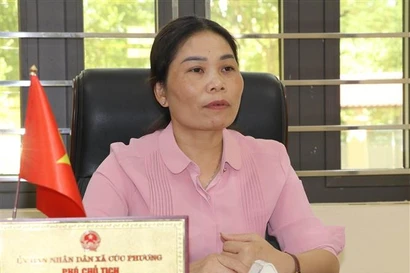 菊芳乡人民委员会副主席丁氏文。图自越通社