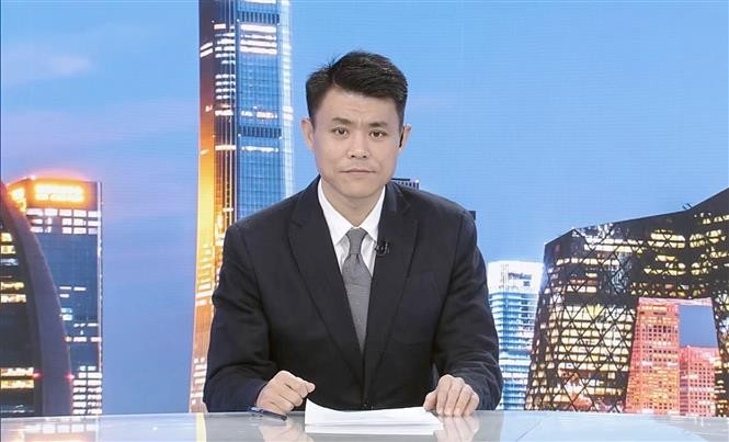 中国中央广播电视总台越南语部主任魏为 图自越通社