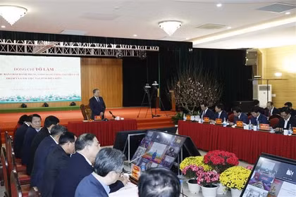 苏林总书记发表讲话。图自越通社