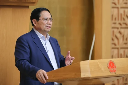 越南政府总理范明政发表讲话。图自越通社