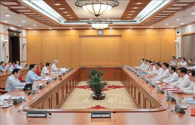国家主席梁强主持会议。图自越通社