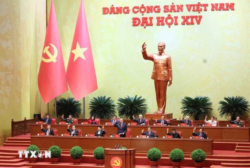 各位代表表决通过了越共第十四届中央委员会委员人数。图自越通社