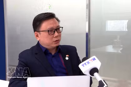 旅韩越南人总会主席陶俊雄接受采访。图自越通社