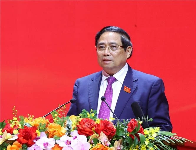 政府总理范明政主持会议。图自越通社