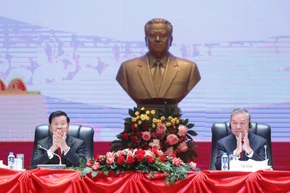 越南共产党第十四次全国代表大会成果通报会在老挝举行