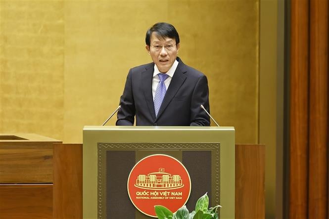 公安部部长梁三光作了报告。图自越通社