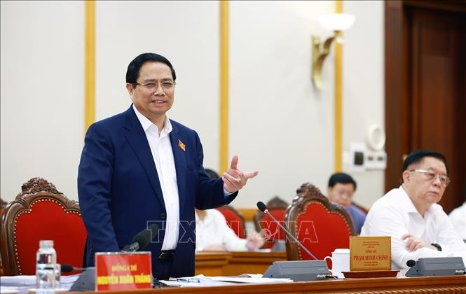 政府总理范明政在与山罗、清化、北宁、谅山等四省省委常务委员会代表进行工作座谈时发言。图自越通社 uuid9f2393ae-1cce-4810-9b19-25248248bbc9code001library1type1mode1loctruecaptrue.jpg
