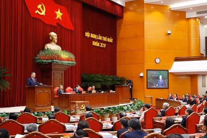 从决议到实践：致力于发展、繁荣与幸福的越南。图自越通社