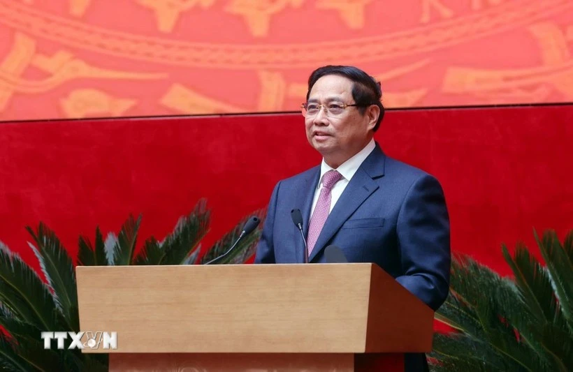 越南政府总理范明政发表讲话。图自越通社