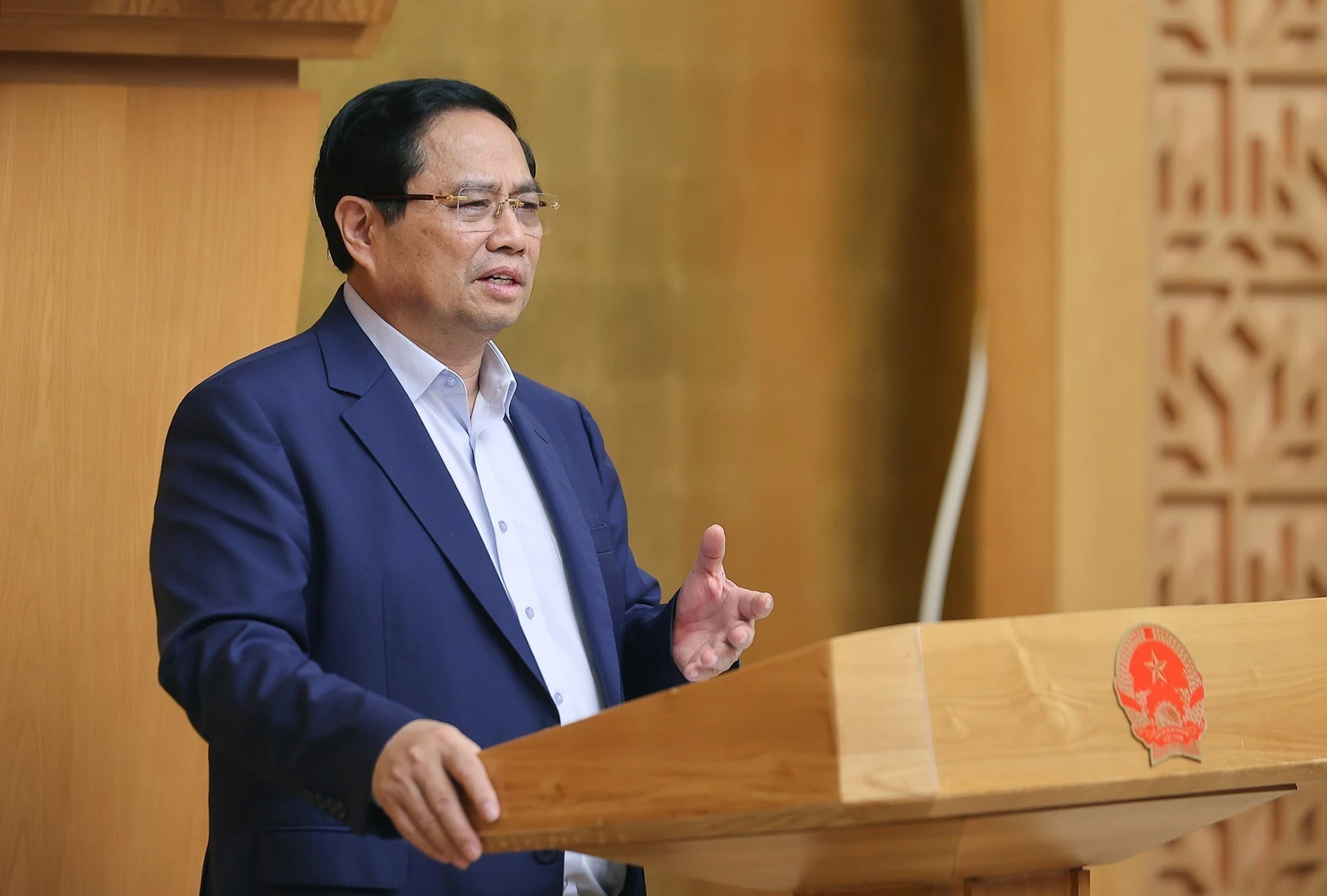 越南政府总理范明政发表讲话。图自越通社