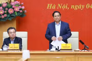 政府总理范明政发表讲话。图自越通社