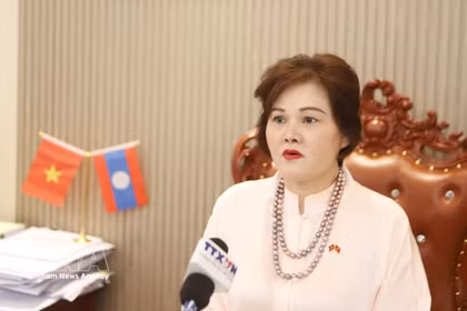范氏明红女士接受越通社记者采访。图自越通社